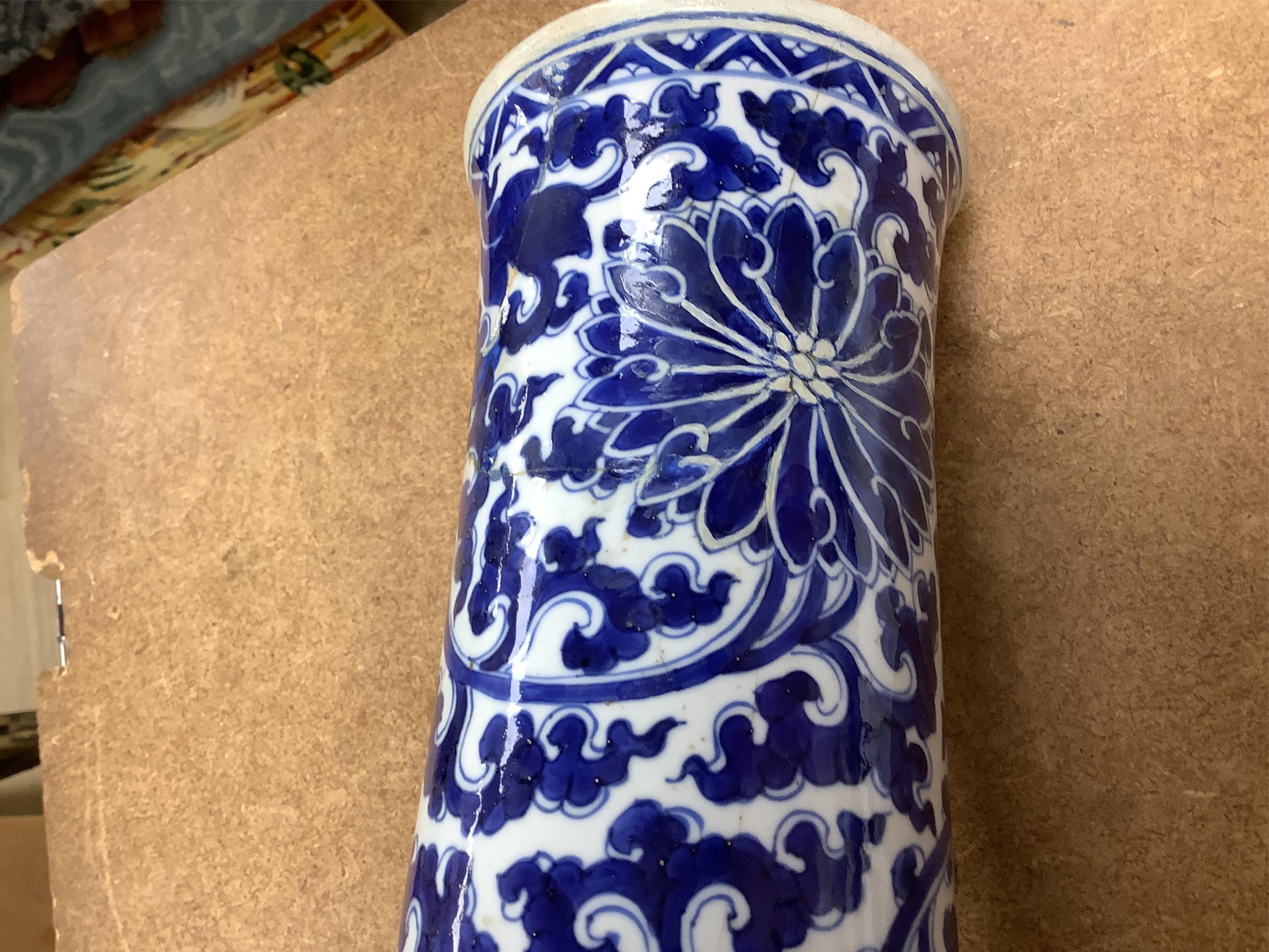 A Chinese blue and white bottle vase with lotus decoration, restored, Kangxi Period, 44cm high